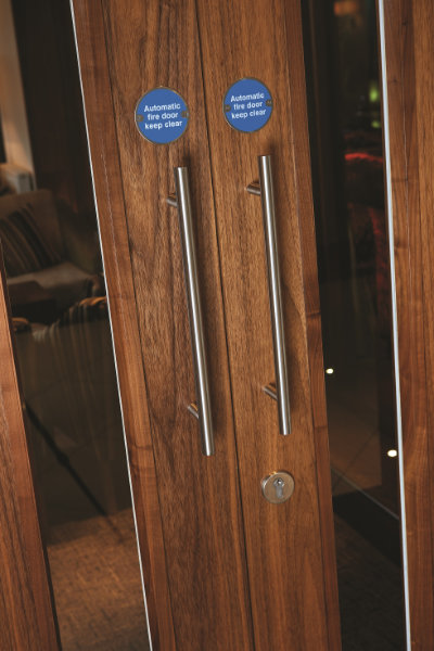 T bar pull handles and fire signage